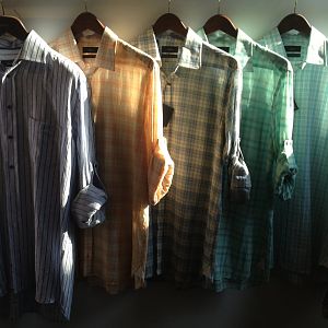 Winter sun illuminates shirts hanging in our showroom in Manhattan