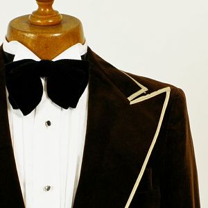 Mens velvet jacket with piping.