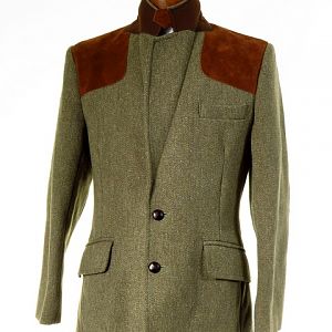 Tweed shooting jacket with suede gun pad to shoulders, suede elbow patches, action back and half belted.