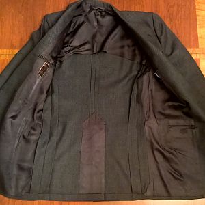 The outer shell and interior construction are relatively thick on the Boardroom jacket. The coat features three-quarter lining.