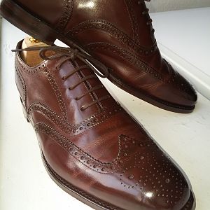 Loake 1880 Buckingham  Dark brown. Polished with burgandy saphir shoe polish for almost a year.