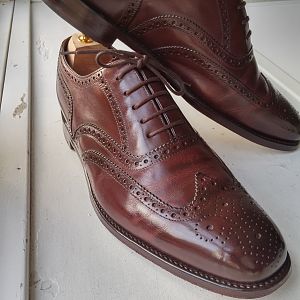 Loake 1880 Buckingham  Dark brown. Polished with burgandy saphir shoe polish for almost a year.