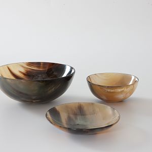Some change bowls from AbbeyHorn. Each one features it's own unique marbling of creams and black.