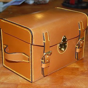 A challenging wee piece! I was asked to copy / interpret a Victorian Officers Mess/shaving kit case. The front/base/back and lid are a single piece of bridle, entirely hand stitched. Only 9" wide, this took 32 1/2 hours to make.