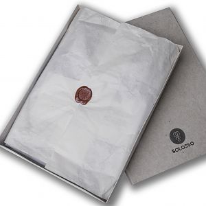 Shirt packaging from recycled materials. A wax seal for an extra personal touch.