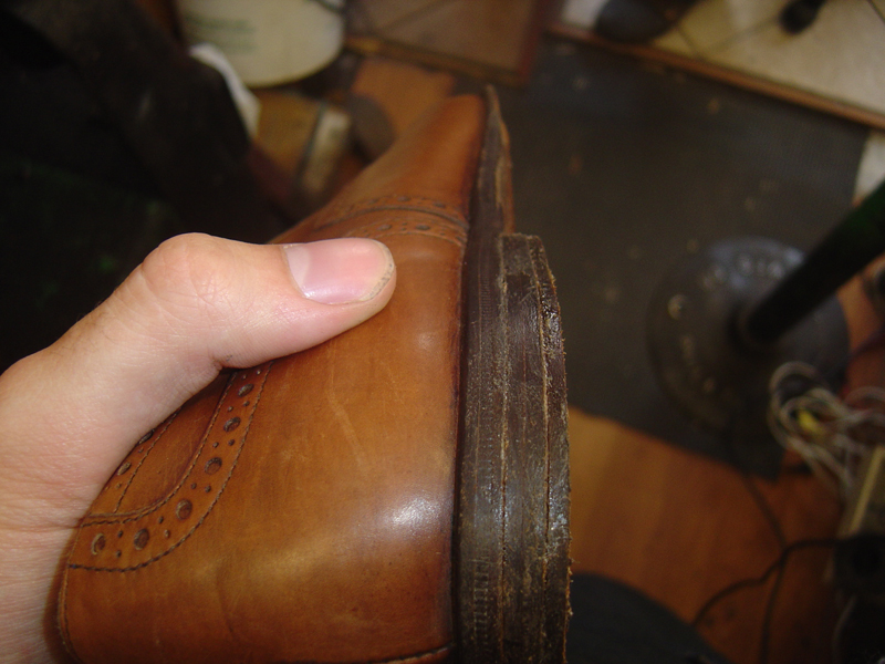 If the heels are just put on top of the sole, there's not much that's keeping them together. Most shoemakers use some big stationary nailers that basically shoot a wire through the sole to take care of that. But we're traditionalists.