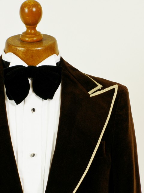 Mens velvet jacket with piping.