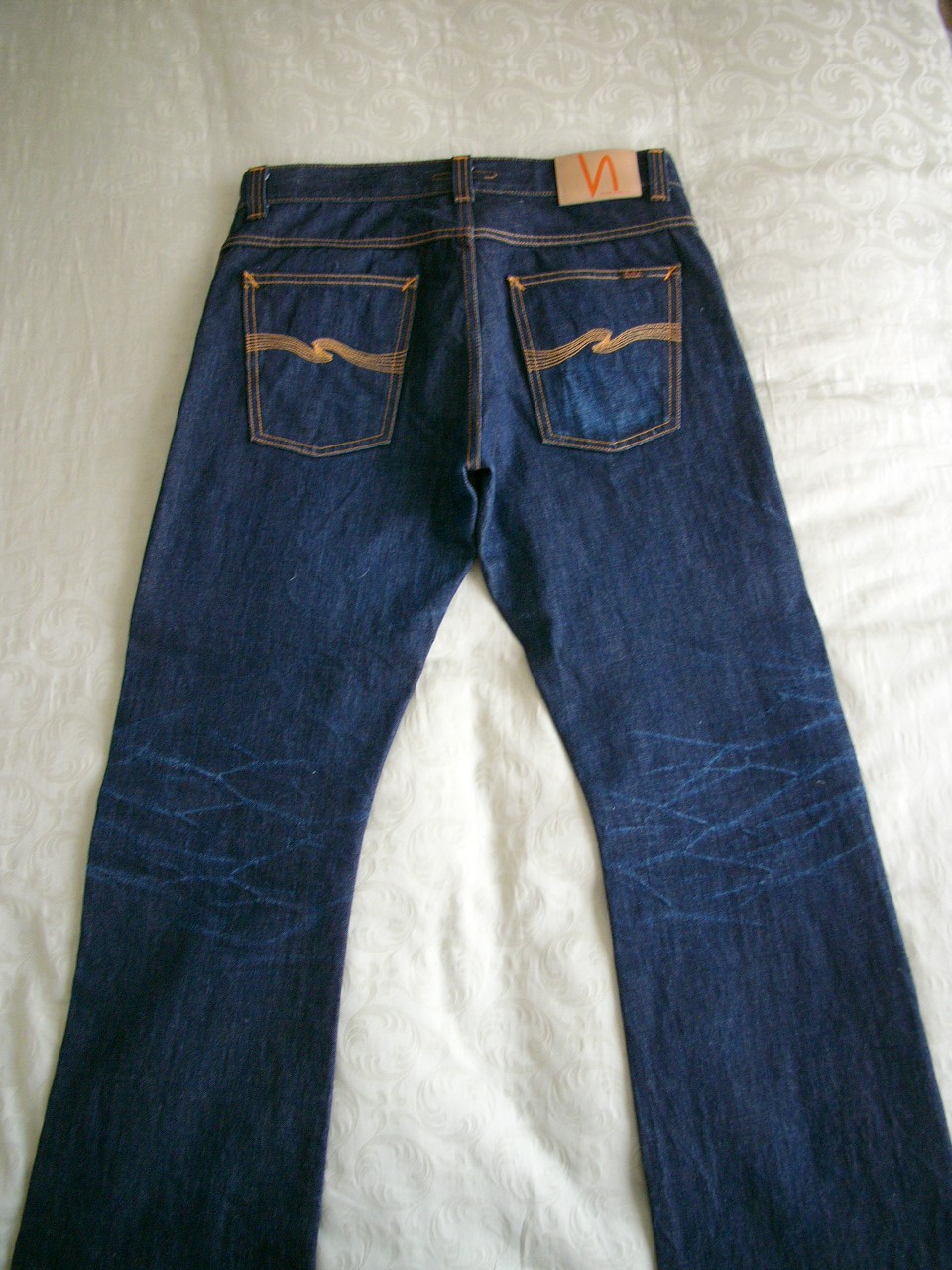 My Nudie RR dry selvedge after moderate use for 6 months and one wash.  The wear marks were accentuated by using a chopped up piece of denim that was soaked in hot water and then rubbed whilst wearing the jeans (edit: effect also accentuated by rubbing damp hands on the jeans.). The back of the knee was also treated the same way: