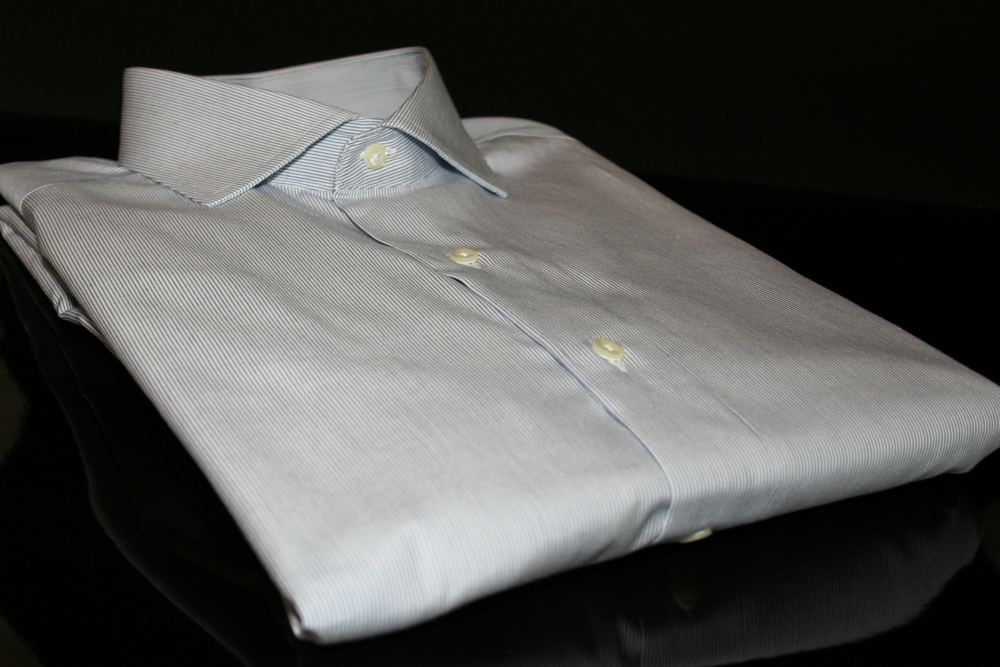 These are images of a custom dress shirt produced by Proper Cloth.  Proper Cloth Shirts are are all made to order and designed by customers. This is made with 80s 2-ply blue thin stripe fabric a spread collar and french cuffs.  Designed at propercloth.com