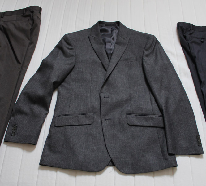 Which color pants with a dark gray sport coat?