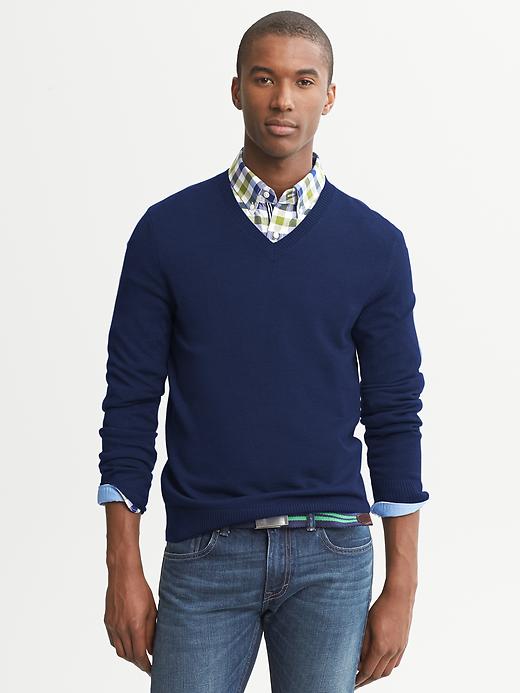 collared shirt under v neck sweater