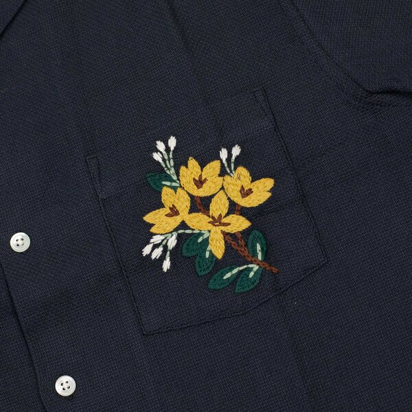 Portuguese_Flannel_Spring_Summer_2024_SS24_Pique_camp_collar_shirt_in_navy_with_floral_pocket_...jpg
