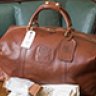 SOLD/GHURKA CAVALIER II NO. 97 DUFFEL/ VINTAGE CHESTNUT LEATHER DUFFEL BAG.NEW