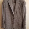 Paul Stuart gray houndstooth suit in size 42R, unlined. SOLD