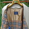 NWT Burberry Raincoat with removable wool liner. Tags included! Size: 40XL