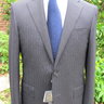 New with Tags Corneliani Solid Black Suit. Size 42R. Retail $1,695