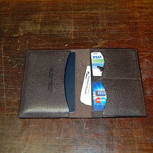 A hand stitched bridle pigskin passport wallet, with card pockets.