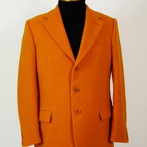 Bright orange Harris Tweed jacket.