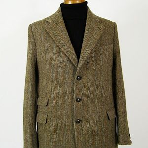 Vintage Harris Tweed jacket with ticket pocket.