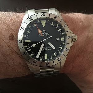 Steinhart Ocean Vintage GMT. This is an homage to the Rolex 1655, the so-called Steve McQueen Explorer II model. It's a lovely watch, if rather large. 42mm at 190g, which makes it a bit heavy. Very well constructed and a bargain at 412/490 EUR