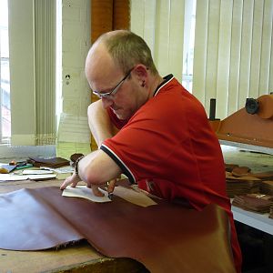 I took this photo at the Cheaney factory in June 2011. I was amazed how he could click with his left or right hand depending on the angle that was needed.