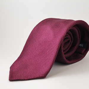 Plum grenadine 7 fold.  Un-tipped, hand rolled edges, very lightly lined.  Hand made in Italy.
$99.95