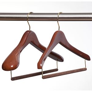 This is a photograph of our Luxury Suit Hanger (left) and Luxury Travel Hanger (right). These two hangers offer unprecedented levels of support, come with Felted Trouser Bars that will not crease trousers, and are available in an unprecedented FOUR widths for a tailored fit.