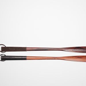 Full-length La Cordonnerie Anglaise rosewood shoehorns with suede and leather handles.