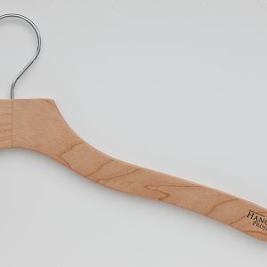 Our Luxury Shirt Hanger in our natural finish. We use a USA maplewood to make all of our natural finish hangers. This is unheard of because of how expensive maplewood is compared to other woods. It is typically reserved for furniture! However, you'll see from this picture, the woodgrain is just spectacular. When you naturally finish a hanger, the quality of the wood is tremendously important. Use a cheap wood and you end up with an ugly hangers.