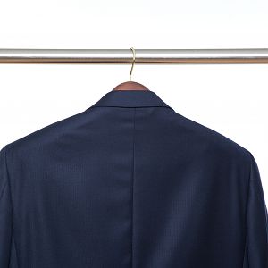 A properly-fitting hanger fills out the shoulders of a jacket and extends all the way to the edge of the shoulder.