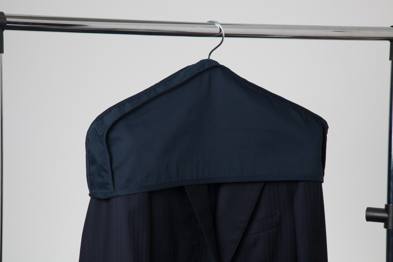 Our new Deluxe Dust Cover. Constructed here in the United States from a high-qualiity 5 oz cotton french twill, these protect garments from accumulating dust in the closet. Smaller, easier to use, and cheaper than our Luxury Garment Bag, which is designed more for longer-term storage.