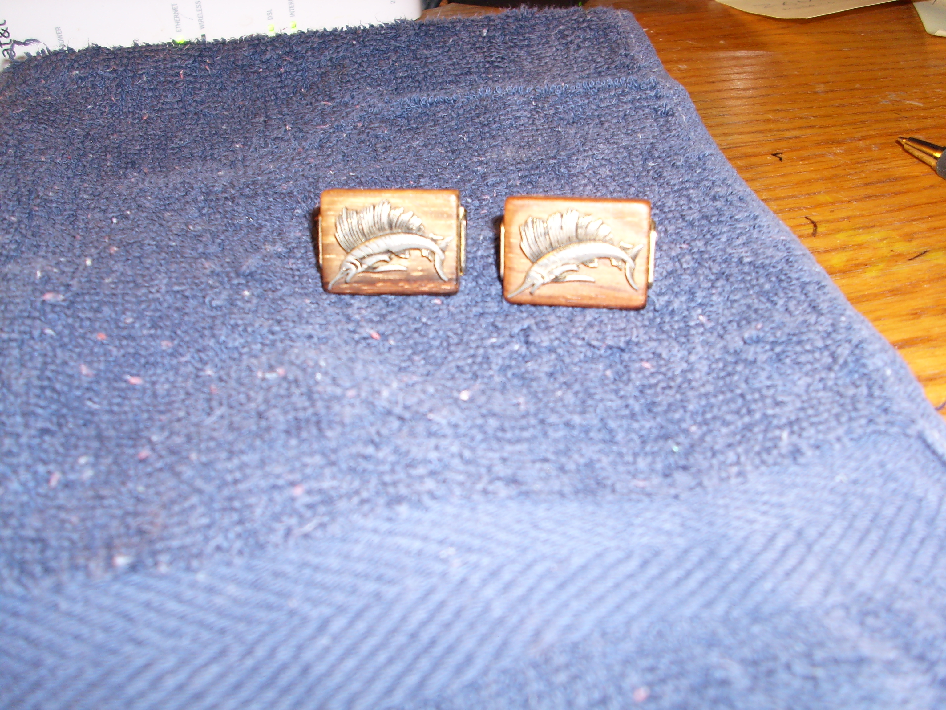 Vintage costume jewelry men`s cufflinks.Wood and silver-tone metal sailfish. Price $2.99